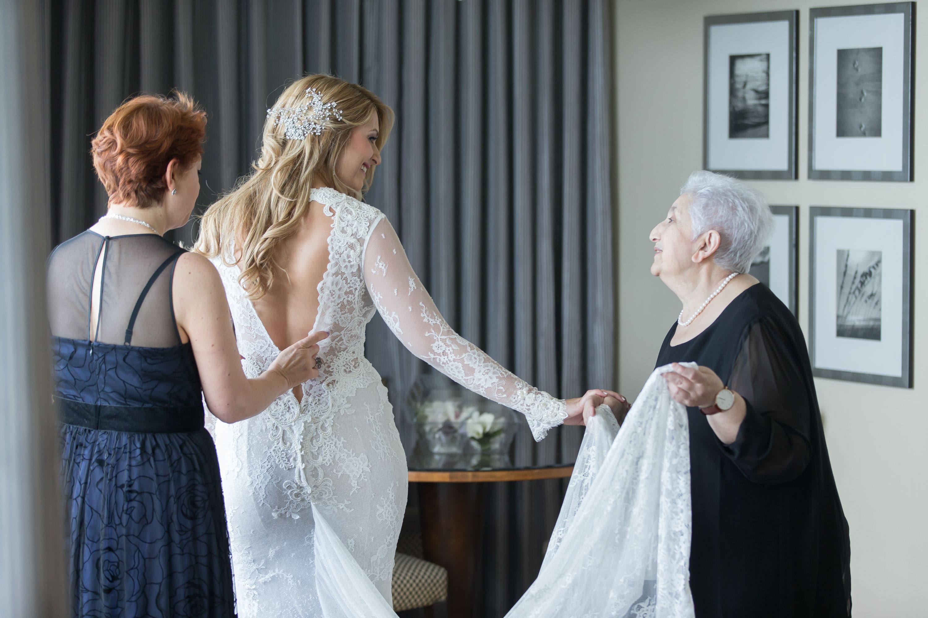 Showing the back of the wedding dress on the wedding day at a Diplomat Beach Resort Wedding