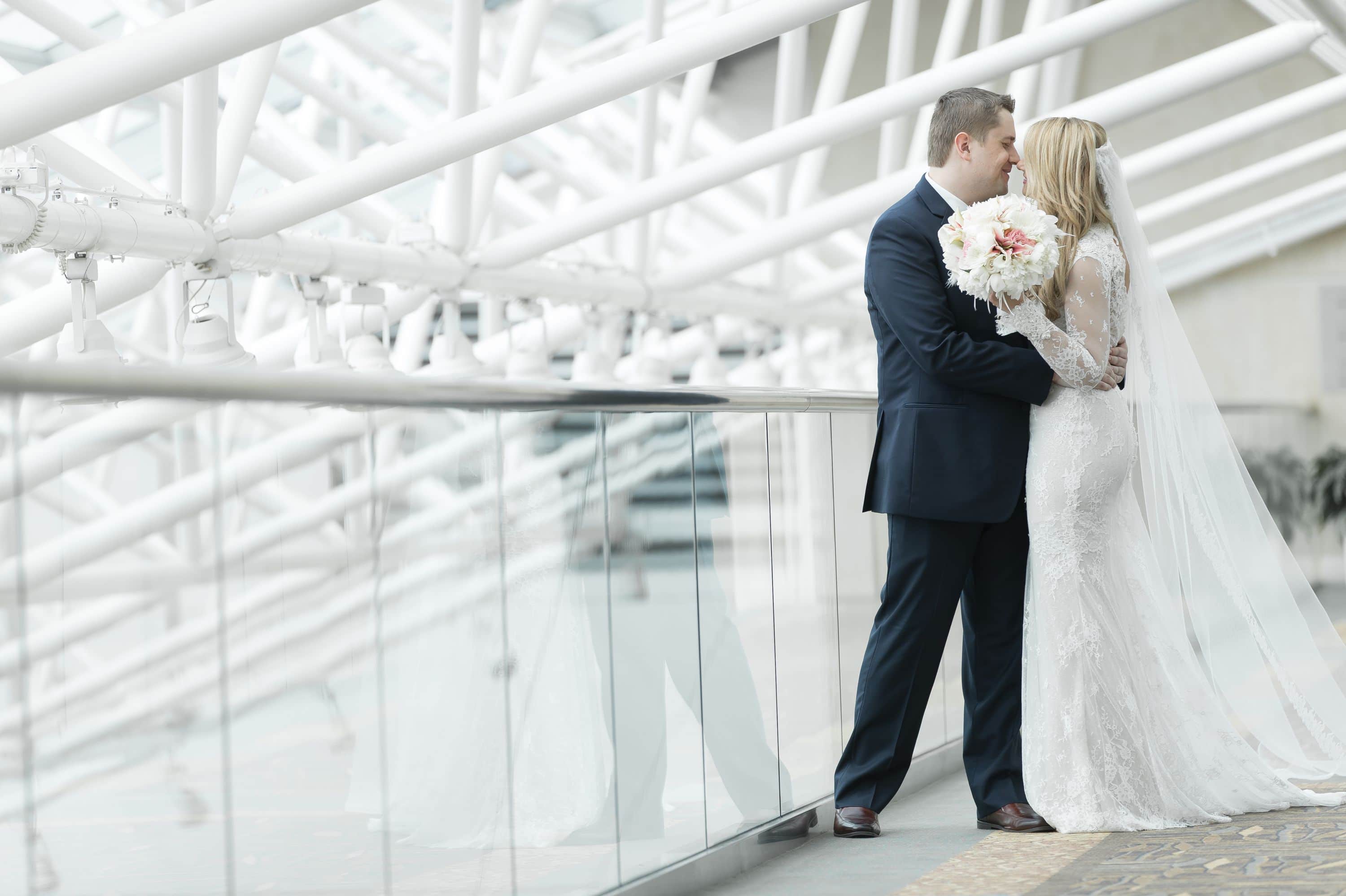 Bride and groom having a moment after the first look at a Diplomat Beach Resort Wedding