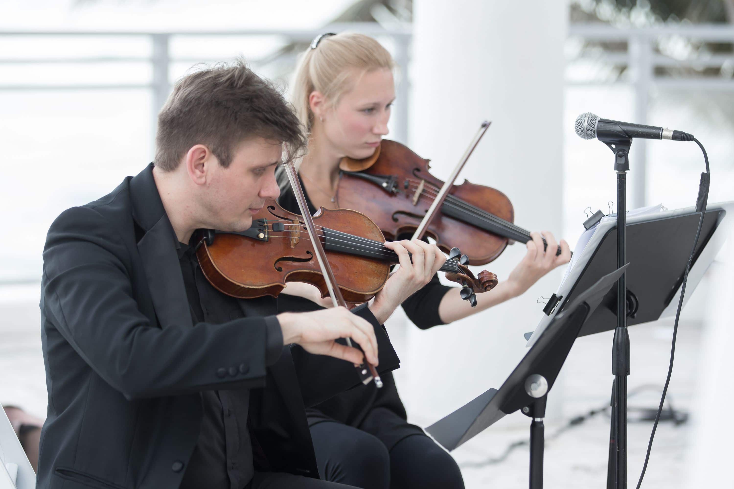 Music being played by hand at a Diplomat Beach Resort Wedding