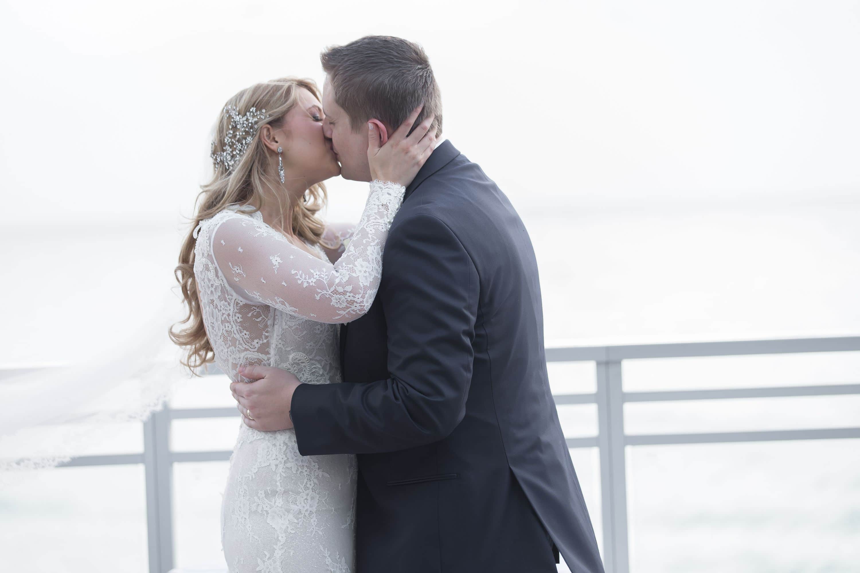 After this Diplomat Beach Resort Wedding the bride and groom kiss