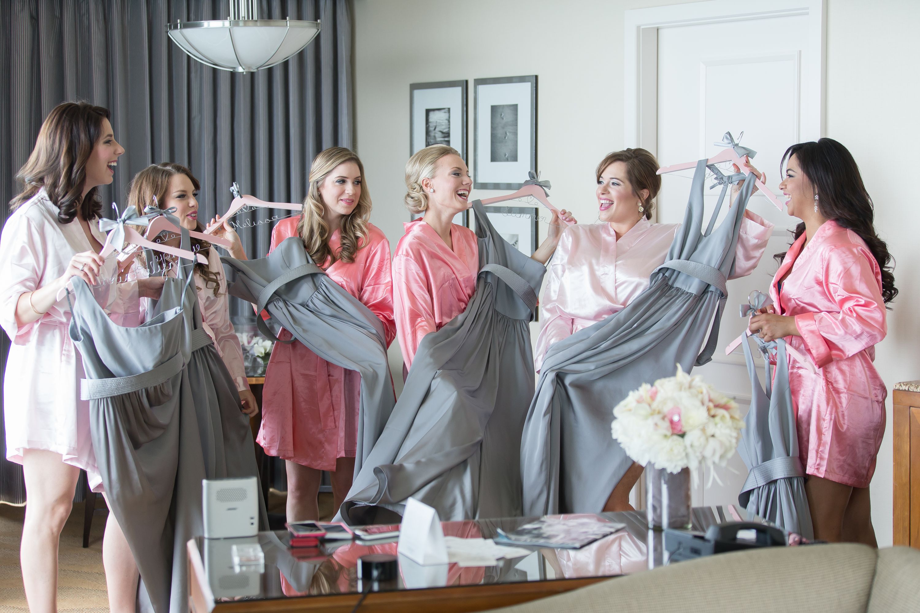 A shot of all the bridesmaids holding dresses at aDiplomat Beach Resort Wedding