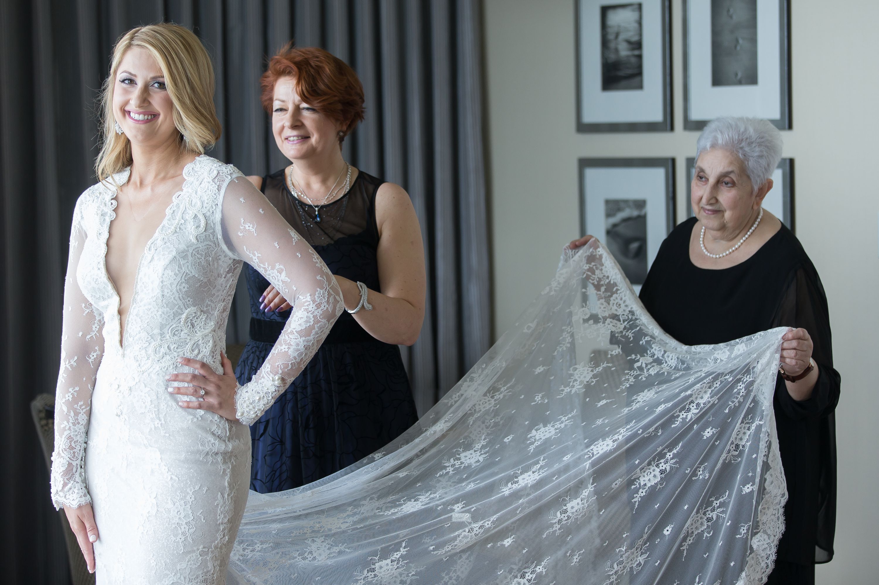 Mom helping bride with grandmother on the wedding day at A Diplomat Beach Resort Wedding